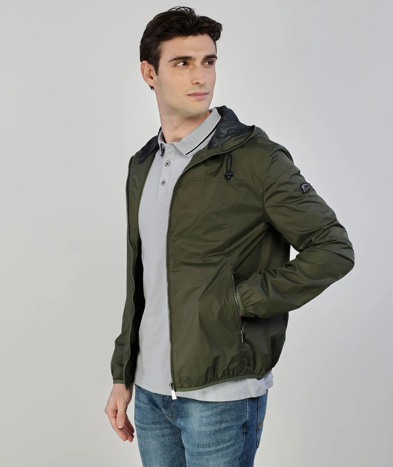 Giacca antivento verde con zip
