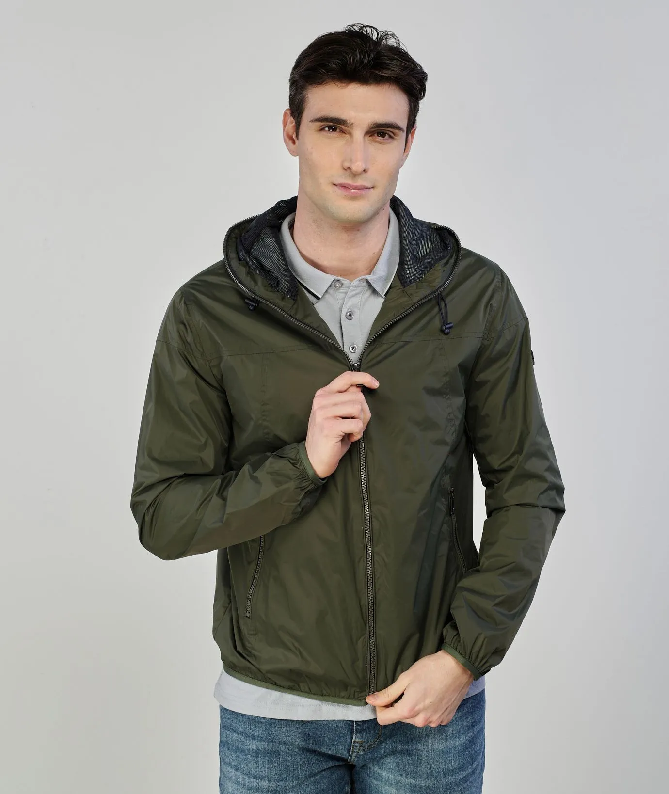 Giacca antivento verde con zip