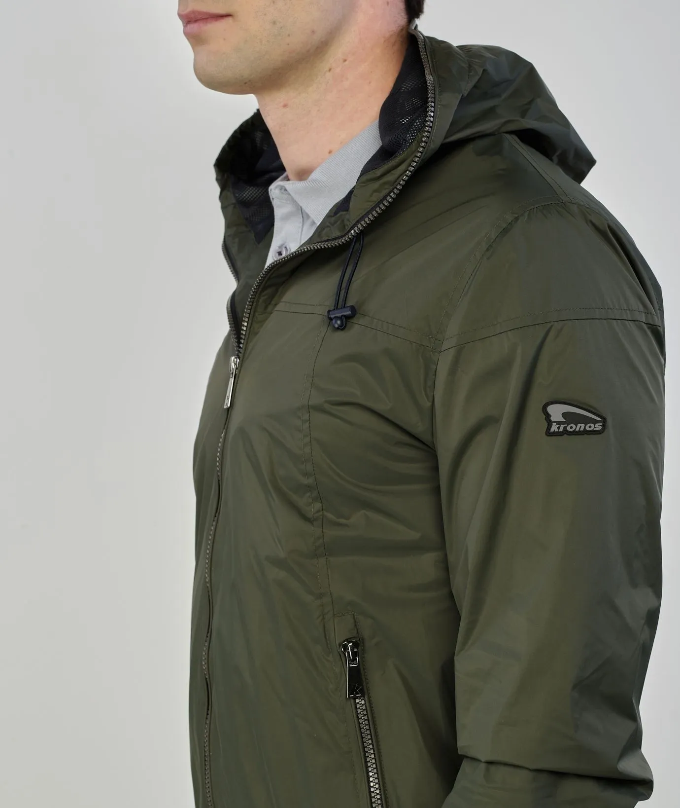 Giacca antivento verde con zip
