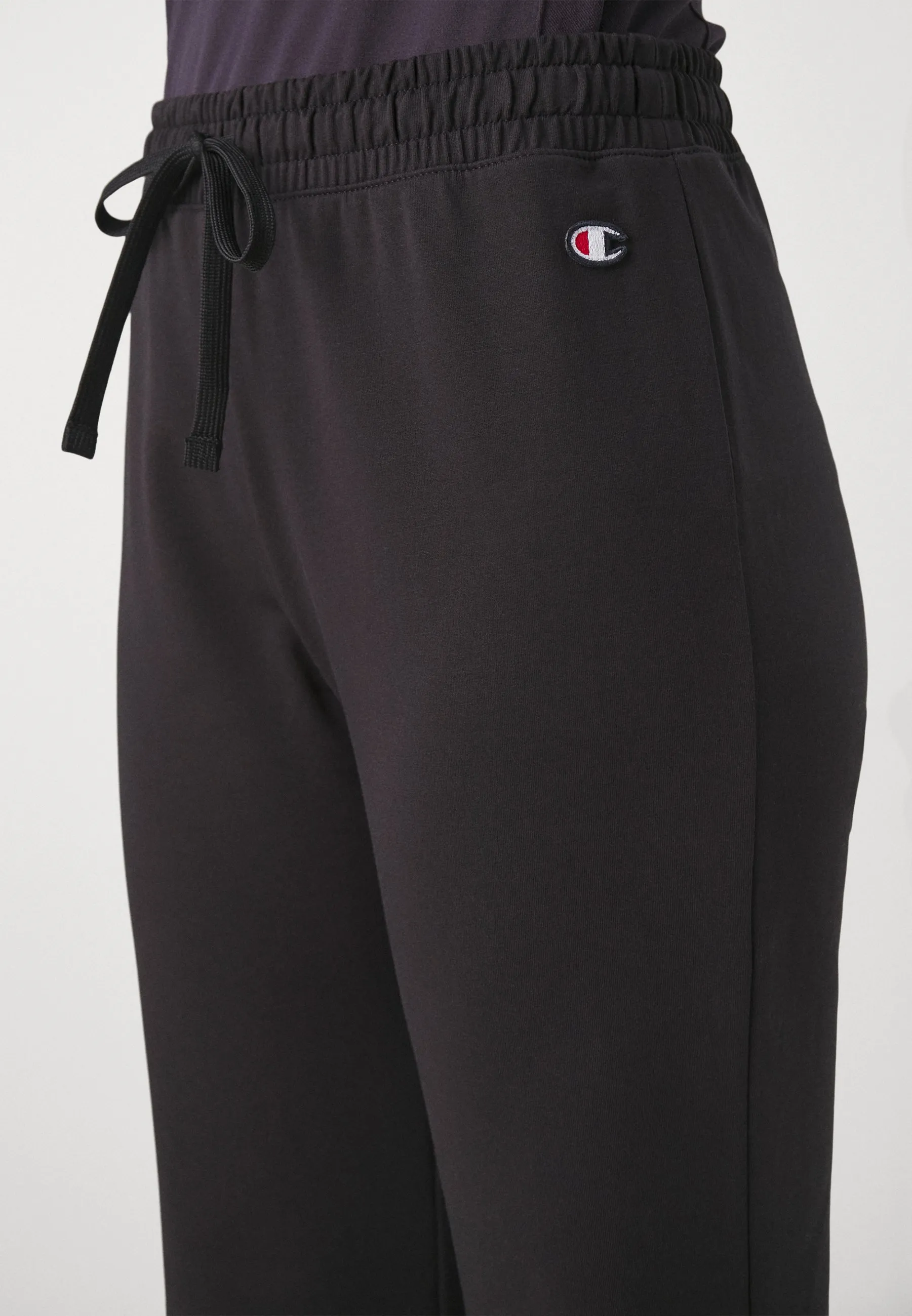 ICONS FLARE PANTS - Pantaloni sportivi